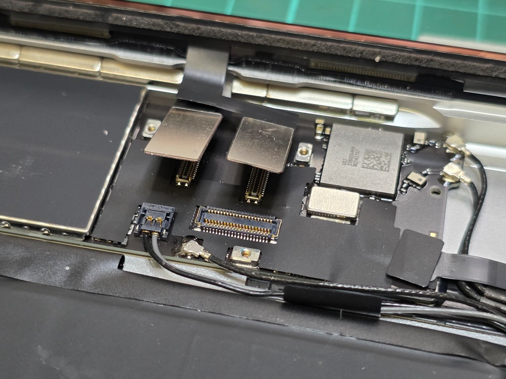 iPad logic board during screen repair at PhoneCell Frome